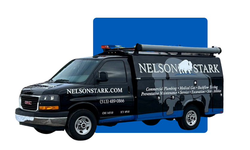 Construction van in front of blue square